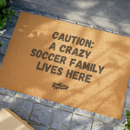 "Caution: A Crazy Soccer Family Lives Here" Doormat